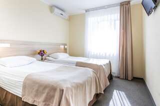 Отель Nikotel Hotel Mykolaiv Николаев Улучшенный двухместный номер с 1 кроватью или 2 отдельными кроватями-4